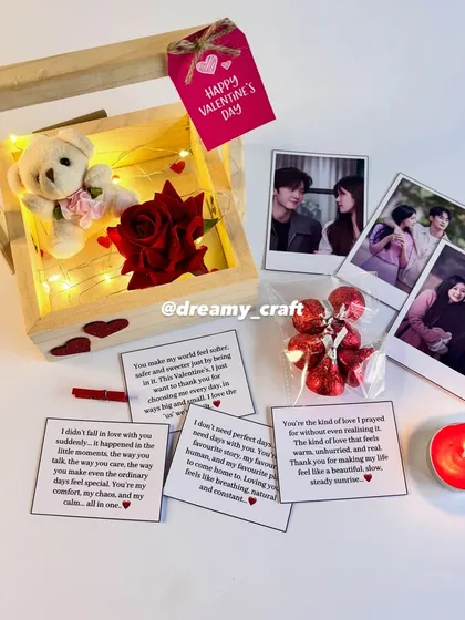 This video shows one of my most popular Valentine's hampers. It includes a wooden box with fairy lights, personal photos, love notes, a teddy, and a candle for a romantic evening.