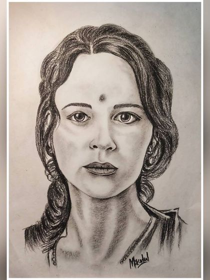 This charcoal drawing of a woman with a bindi shows my ability to capture both modern and traditional elements in a single portrait.