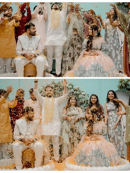 A joyous group photo from the Haldi ceremony. We captured the moment everyone showers the couple with flower petals, resulting in a fun, chaotic, and beautiful memory.