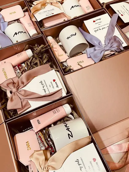 Asking your friends to be your bridesmaids is a special moment. We put together these personalized proposal boxes, each with a custom mug, beauty products, and other goodies, all tied together with beautiful ribbons in different pastel shades.