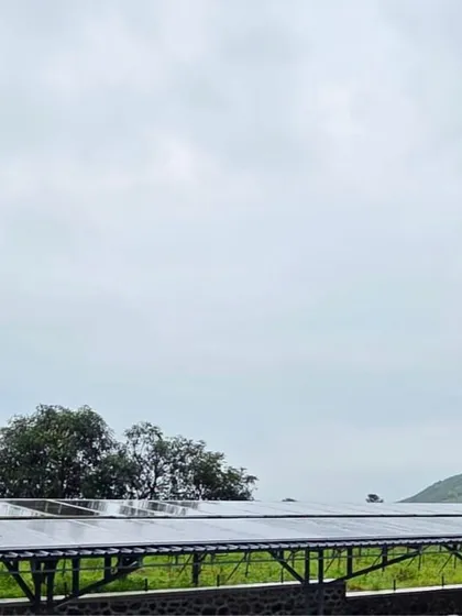 The solar panels installed at a scenic farmhouse in Nashik, Maharashtra. Even on a cloudy day, these high-efficiency panels continue to generate power, ensuring the farm has a consistent energy supply.