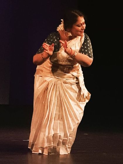 A moment of joy and expression from our "Tradition and Transition" performance.