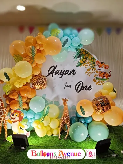 A slightly different angle of the main jungle backdrop, highlighting the balloon colors and animal cutouts.