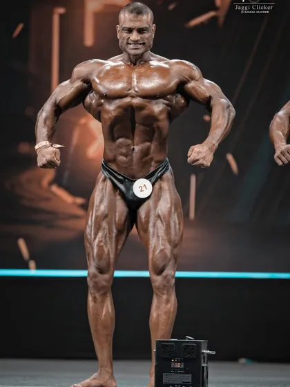The front relaxed pose, captured by the judges' camera. This is the foundation of your stage presence, and it must be practiced to perfection.