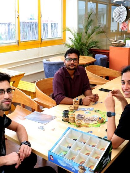 A game of 'Wandering Towers' being played in a bright, sunlit corner. My space is perfect for enjoying board games at any time of day.