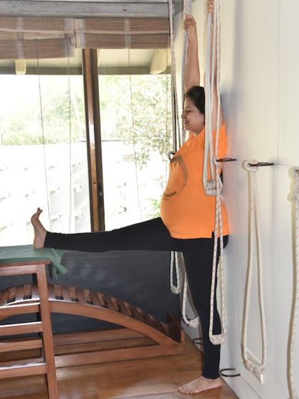 This student is practicing a supported standing pose during her pregnancy. My prenatal classes focus on keeping expecting mothers strong, healthy, and calm, preparing them for a smooth delivery and helping to prevent post-pregnancy blues.