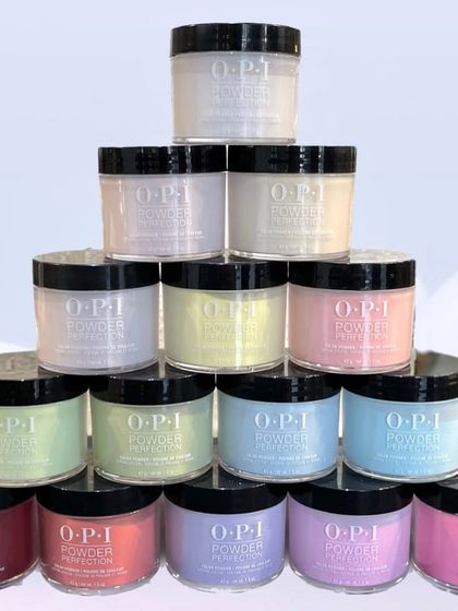 Just a peek at my extensive collection of OPI dip powders. With a rainbow of colors to choose from, we can find the perfect shade for your next manicure.