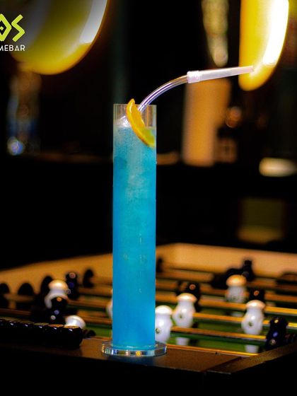 Hop over for a Bullfrog LIIT. This electric blue drink is a jumpstart to your night, served over the foosball table.