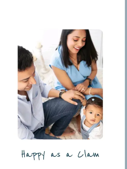 "Happy as a clam." A sweet, candid moment of a family enjoying their time together during a studio photoshoot.