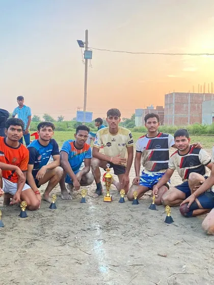 The team with their impressive collection of trophies after the Hapur tournament.