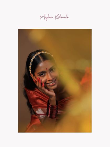 A candid, joyful moment captured during a campaign shoot. The warm, diffused light and the model's genuine smile create an image that is both beautiful and relatable, perfectly aligning with our goal of creating authentic visuals.