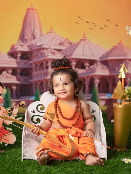 May the divine blessings of Lord Rama shower upon us. A happy little Rama with his bow and arrow, and little Hanuman by his side.