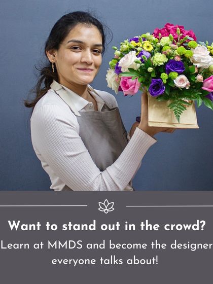 Want to be the designer everyone talks about? This student, holding her professional-quality arrangement, embodies the skill and artistry I teach in my career-focused courses.