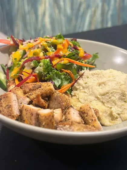 The Grilled Chicken Meal is a perfect balance of protein and carbs. I serve juicy grilled chicken with a side of creamy mashed potatoes and a fresh, crisp salad for a complete and satisfying meal.