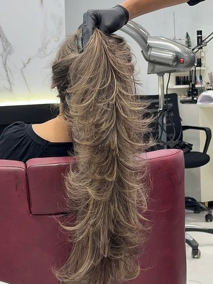 The full length of this stunning ash blonde hair, showing the incredible detail in the layers and highlights.