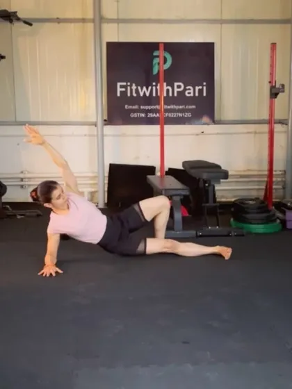 A side plank with the top leg extended. This variation increases the challenge on the obliques and improves hip control.