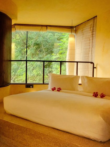 The sunken bed design creates a unique, cozy sleeping environment, low to the ground and connected to the earth.