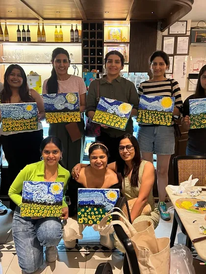 Another wonderful group shot from our 'Starry Night' knife painting workshop, with every artist showing off their work.
