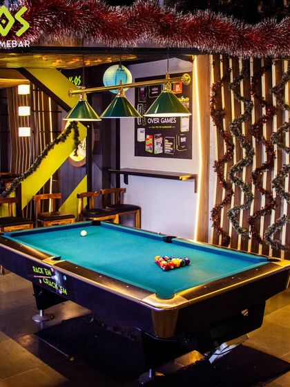 The pool table is ready for you. Rack 'em up and get ready for a game. It's the centerpiece of our game zone for a reason.