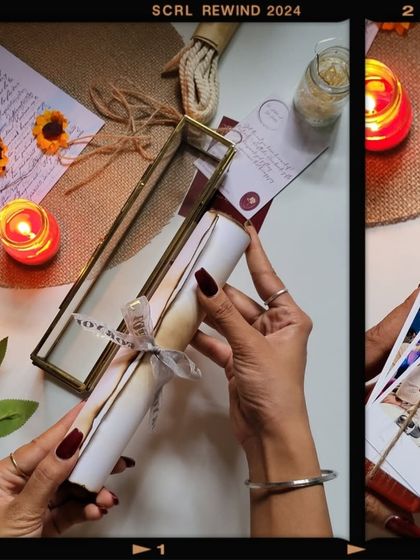 A split-screen view showing the scroll being placed in the box and a detail of the gift wrapping. Every step is done with care.