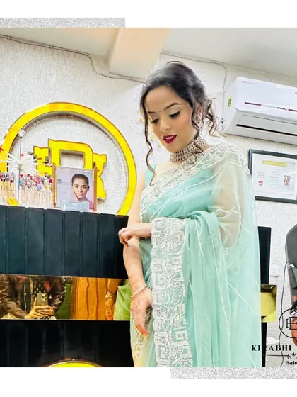 The final look. This client looks absolutely stunning in her mint green saree, with her hair and makeup perfectly complementing her outfit.