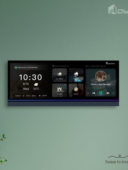 A clean shot of the HomePad mounted on a green wall, demonstrating its ability to complement interior design choices while offering powerful functionality.