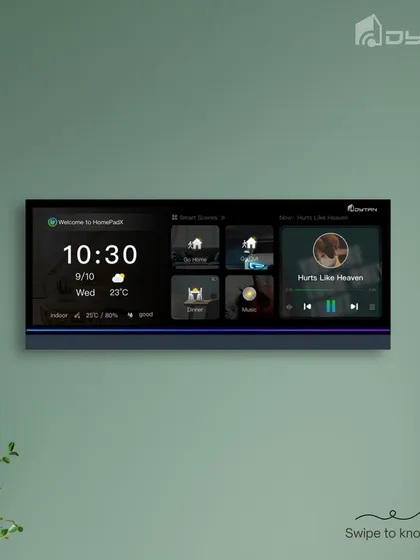 A clean shot of the HomePad mounted on a green wall, demonstrating its ability to complement interior design choices while offering powerful functionality.