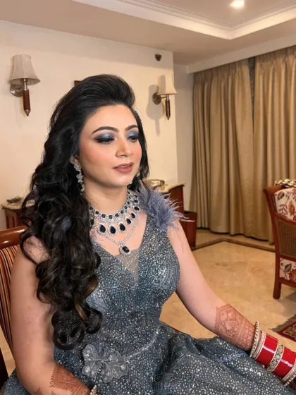 Another shot of the bride's dramatic engagement makeup. The smokey eyes and fluttery lashes are the stars of this look.