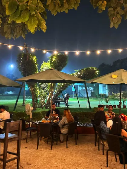 The cafe patio at night is a popular spot for unwinding after a long day.