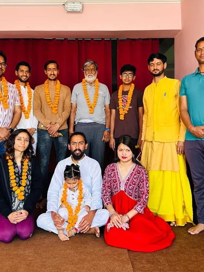 A group photo from one of our graduation ceremonies. We welcome all our students into the Vyas Yoga family.