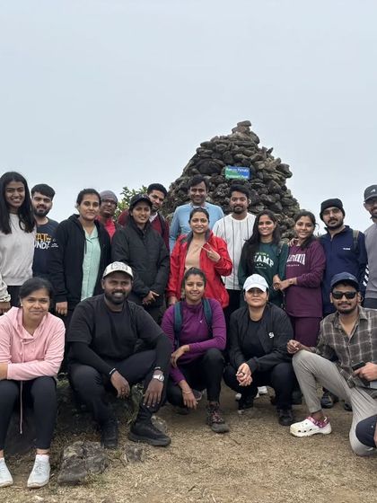 A large and cheerful group from one of my Kumaraparvatha batches, posing together at a scenic spot.