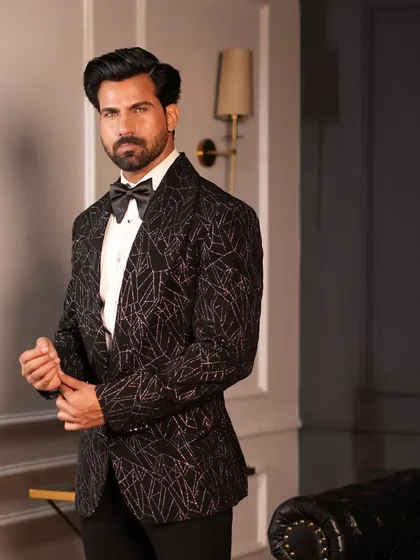 The Starry Black Tuxedo is a masterpiece of understated elegance, perfect for the modern gentleman.