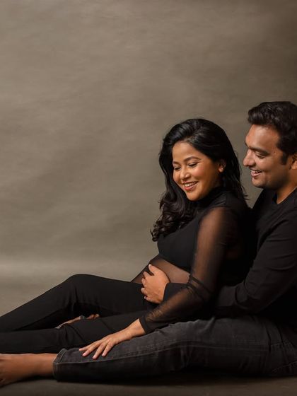 A relaxed, seated pose that feels intimate and real. It’s about capturing the comfort you find in each other.