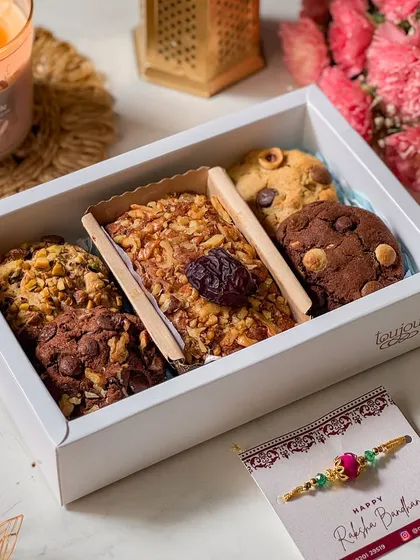 My "Guilt-Free Hamper" for the health-conscious sibling, featuring refined sugar-free and gluten-free cookies and bars. It's an indulgent gift that is still mindful of dietary preferences.