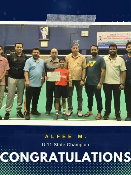 Alfee M., our U11 State Champion, with his coaches and the trophy, a proud moment for the academy's junior program.