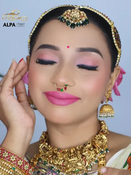 A smiling portrait that captures the joy of the bride, with her makeup looking fresh and radiant.