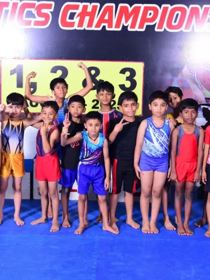 Our young male gymnasts posing for a group photo at the 3rd Edition Gymnastics Championship. Their energy and sportsmanship were fantastic to see.