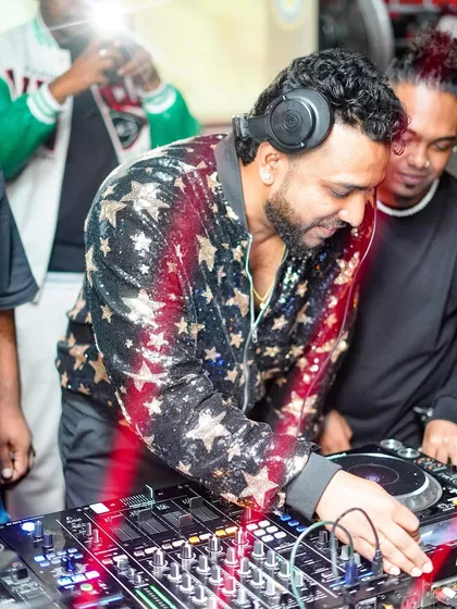 In the zone, crafting a story with sound. This is where I connect with the music and the crowd, making sure every transition and beat drop feels just right.