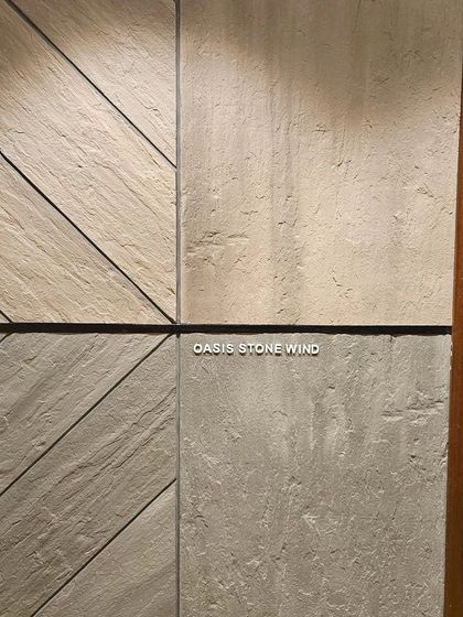 'Oasis Stone Wind' panels from Ittimi. The combination of smooth and diagonally textured surfaces within one panel adds a dynamic quality.