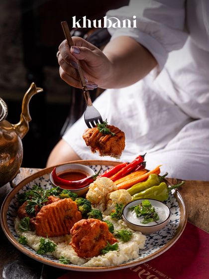 Indulge in the exquisite blend of flavors with our Kadinbudu Kofte, a true Turkish delight. These savory, spiced meatballs are wrapped in a perfect crunch, offering a taste of tradition.