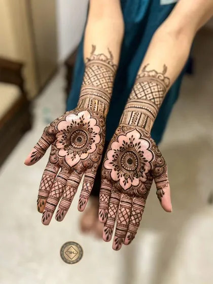 A perfectly symmetrical and intricate mandala design. This style is a favorite for its elegance and balance, making it a beautiful choice for any event, from parties to festive gatherings.