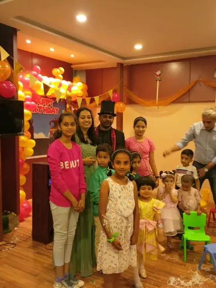 A lovely family photo after a birthday party performance. I am happy to pose with the birthday child and their family to capture the memory.