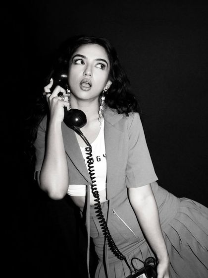 Using props like this vintage phone added a quirky, narrative element to the GQ India shoot with Ahsaas Channa. Styling is not just about clothes, it's about creating a whole mood.