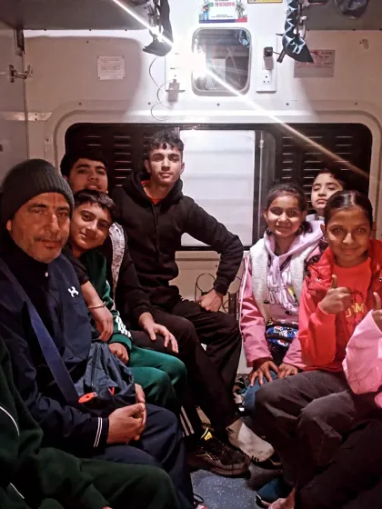 Everyone is in high spirits inside the train. These journeys teach students independence and teamwork off the mat as well.