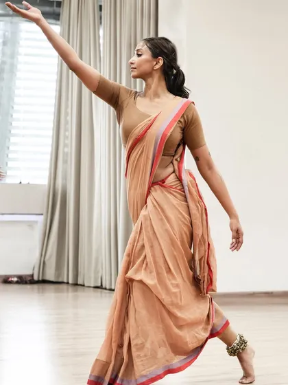 A graceful pose from a 'Sitayana' rehearsal, showing the classical lines that underpin my contemporary work.