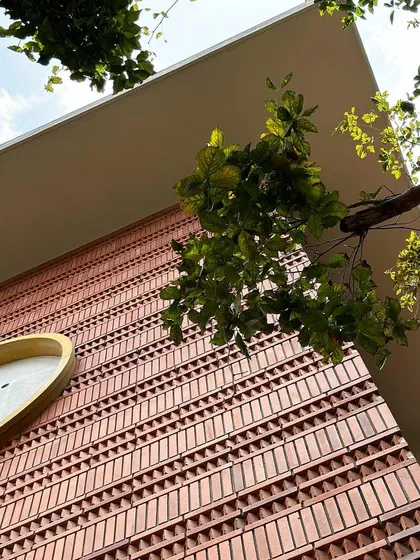 Close-up shots of the patterned brick facade. This level of detail is a hallmark of our work, showcasing the skill of our masons and our commitment to creating tactile, handcrafted building surfaces.