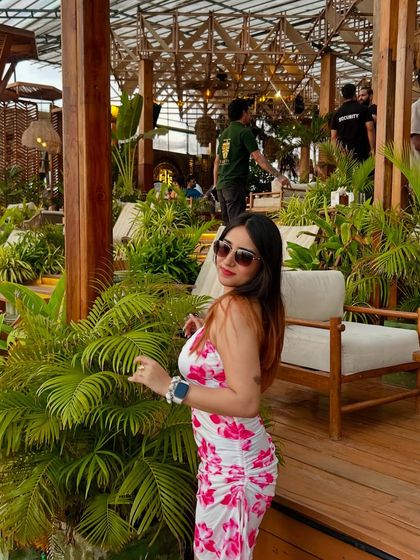 A final look at the pretty floral dress. This is a perfect example of a versatile outfit that works for many occasions.