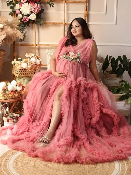 A serene and beautiful pose, as she looks away thoughtfully. The soft lighting and romantic setting are perfect.