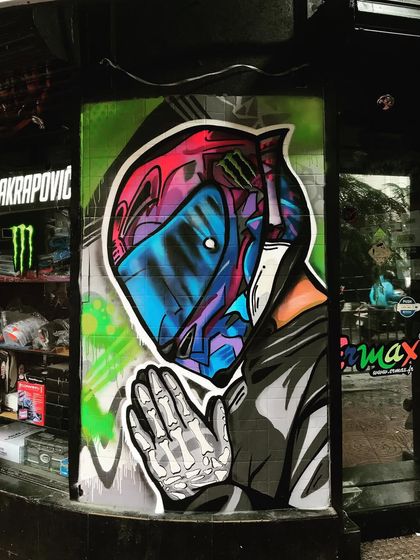 Another angle of the helmet mural, showcasing the color blending and detail work. Our murals are designed to look great from every perspective.