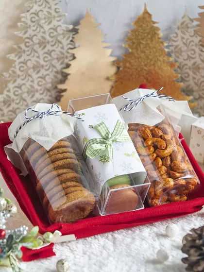 My Christmas hampers bring festive cheer with a delicious assortment of treats. This tray includes my popular cookies, flavored nuts, and other baked goods, perfect for sharing during the holiday season.